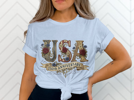 White t-shirt with "USA 250th Anniversary" text and floral embellishments.