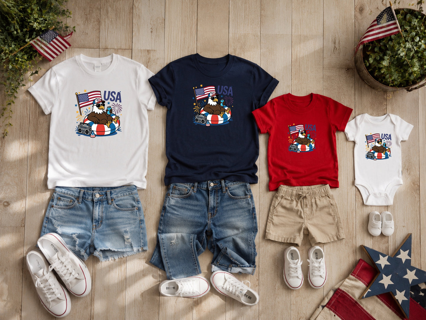 T-shirts and shorts with patriotic USA themes and graphics, arranged flat.
