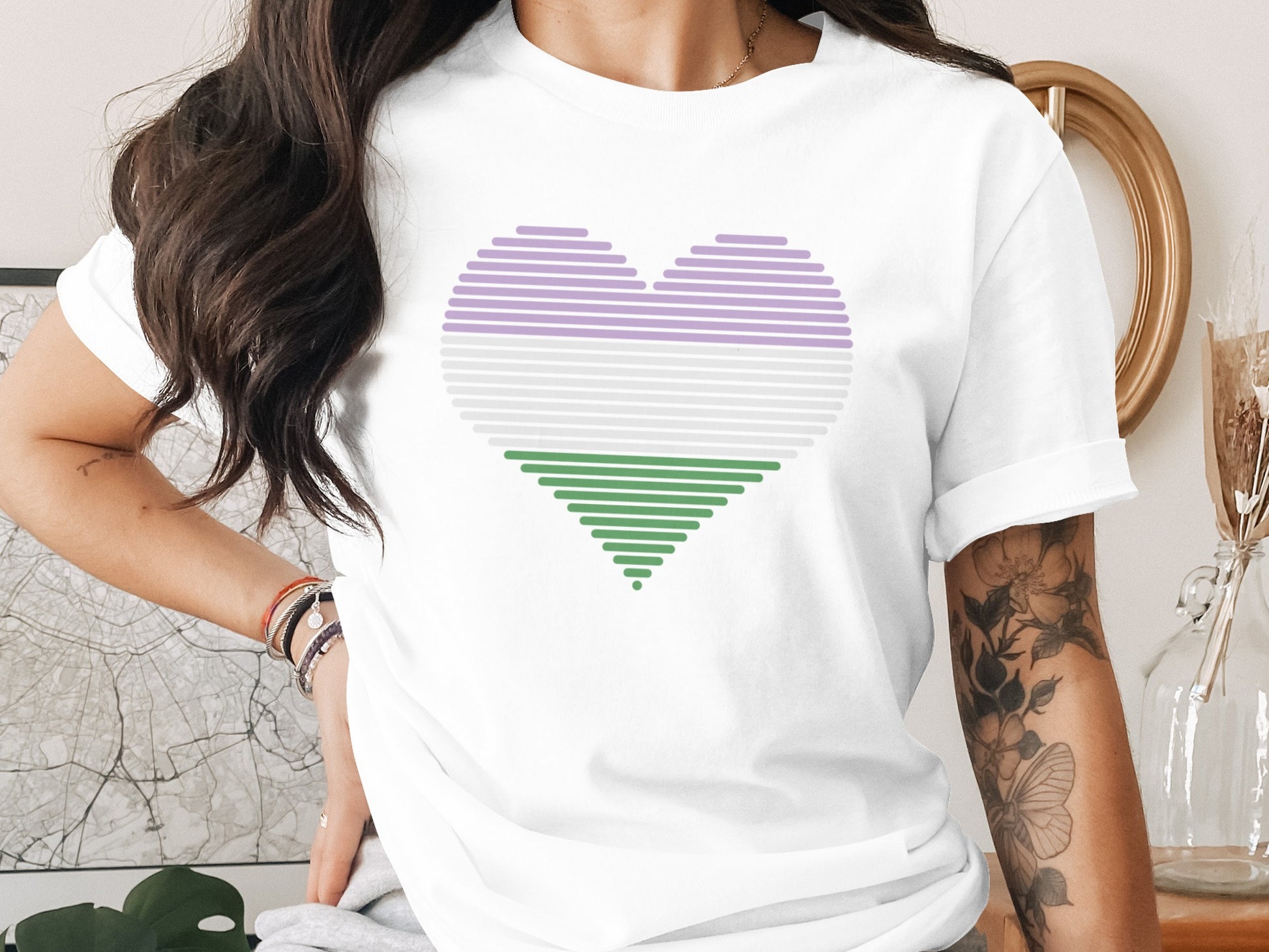 White t-shirt with a striped genderqueer pride heart design.