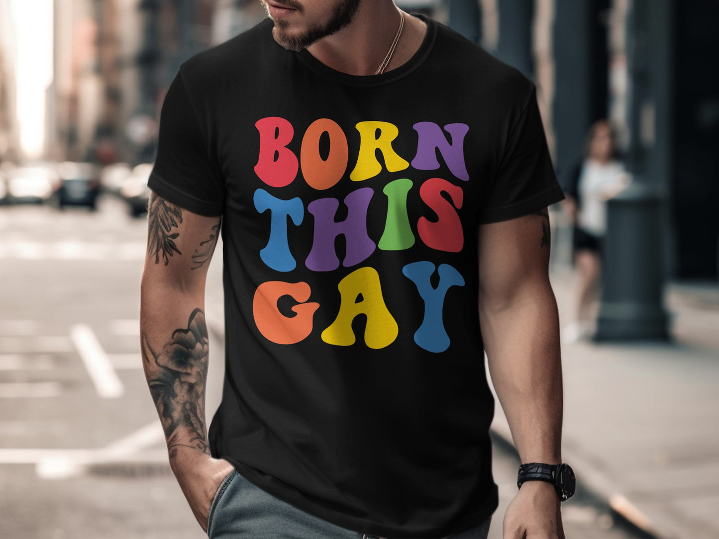 Black t-shirt with "BORN THIS GAY" in colorful rainbow lettering.