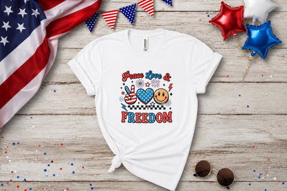White t-shirt with "Peace Love Freedom" text and patriotic graphics.