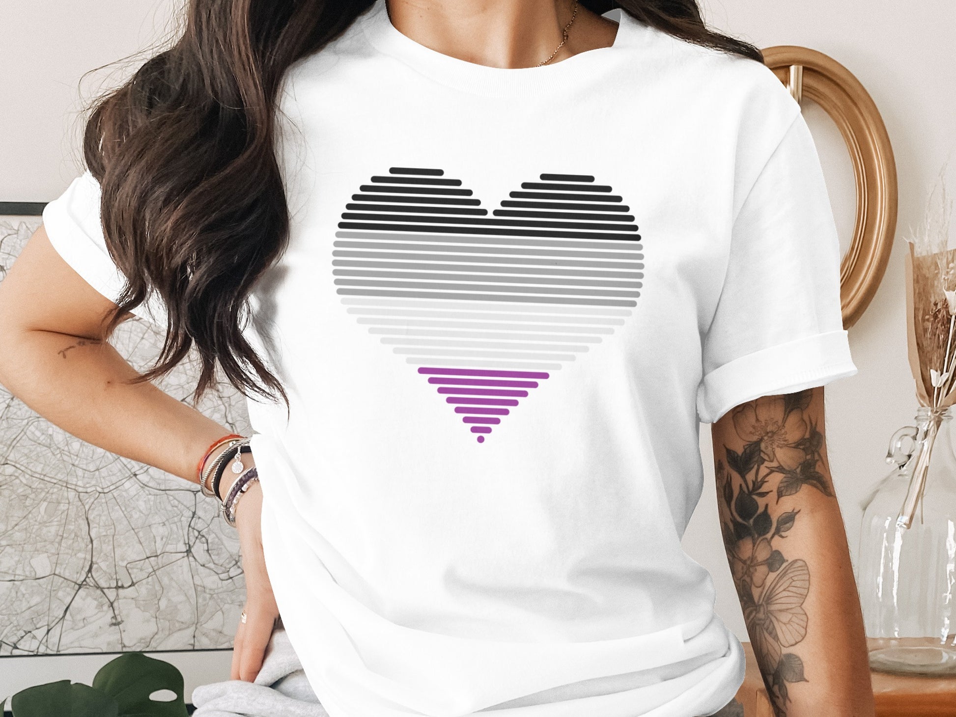 White t-shirt with asexual pride heart design.