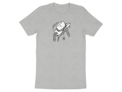 Skeleton hands hold a cowboy hat with a spider dangling below on a grey t-shirt.