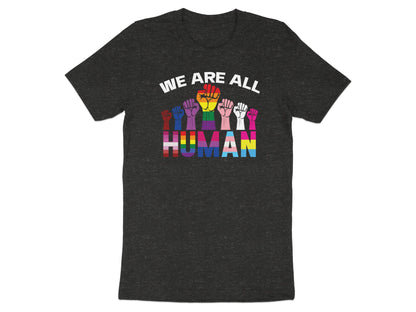 T-shirt with "WE ARE ALL HUMAN" and rainbow and pride flag fists.