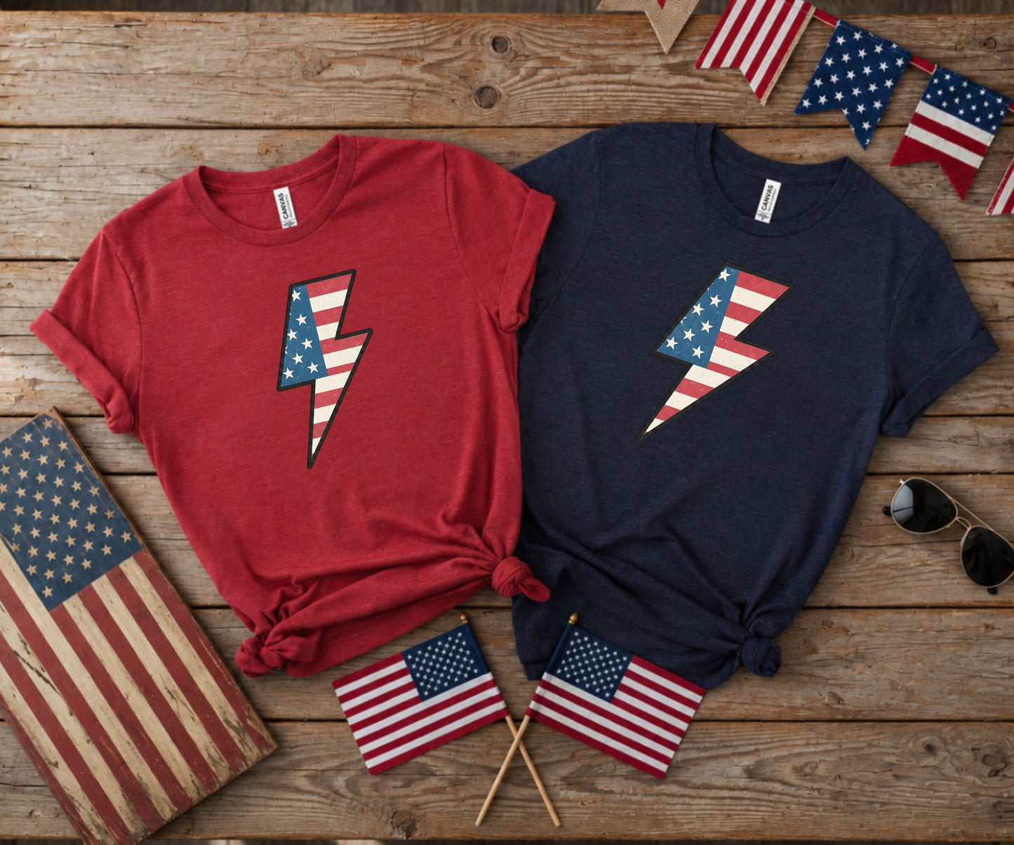 Two t-shirts, red and navy, with patriotic lightning bolt graphic.