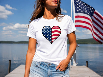 Woman in white t-shirt with American flag heart logo, denim shorts.