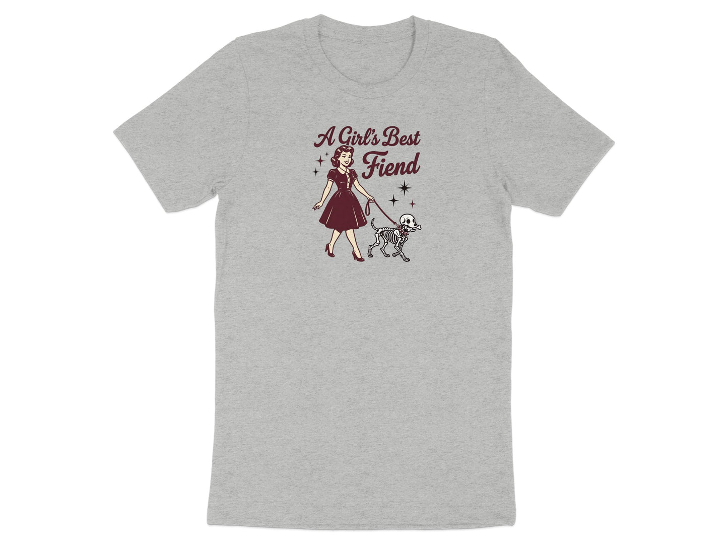 Woman in maroon dress walks skeleton dog with text "A Girl's Best Fiend".