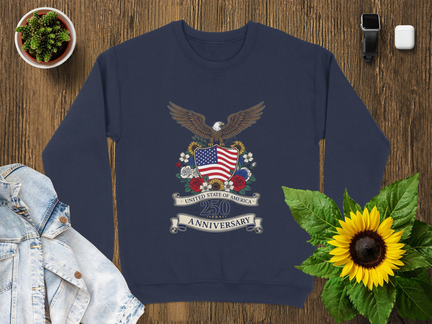Navy sweatshirt with "United State of America 250 Anniversary" eagle emblem.