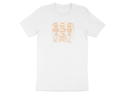 White t-shirt with cartoon skeletons and skulls graphic with pink bows.