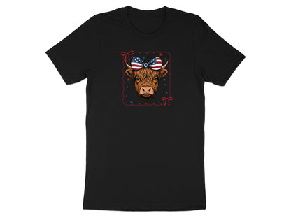 Black t-shirt with patriotic Highland cow graphic wearing an American flag bow.