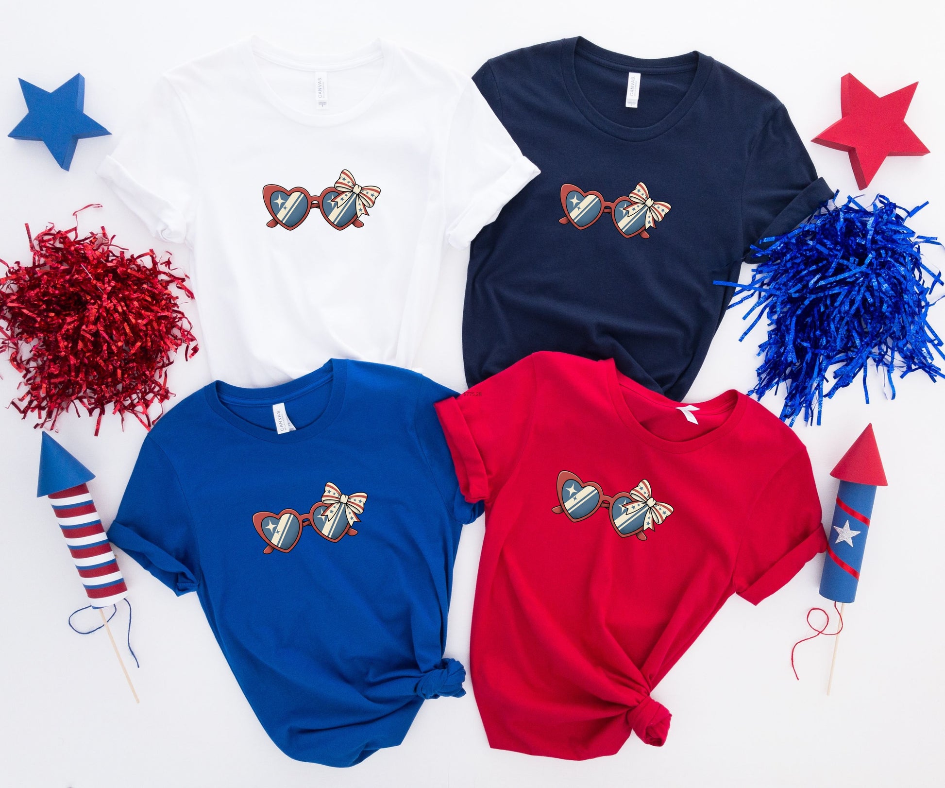 Four t-shirts in red, white, blue, and navy, each with patriotic heart sunglasses graphic.