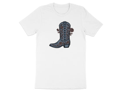 Blue cowboy boot with floral embroidery on a white t-shirt.