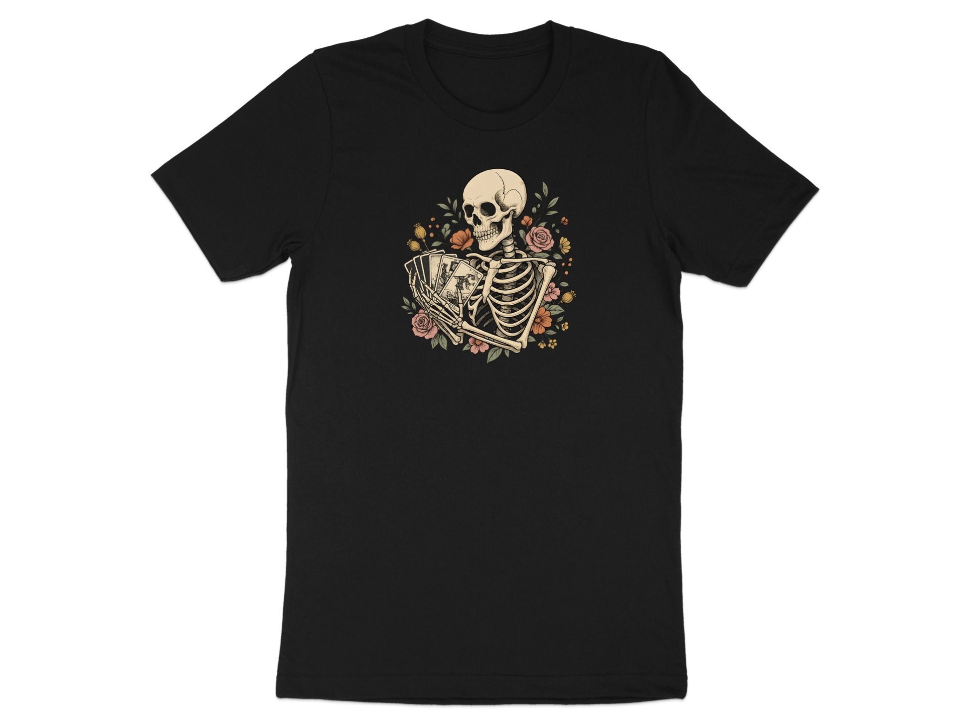 Skeleton holding tarot cards surrounded by flowers on a black t-shirt.