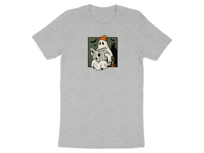 Ghost wearing beanie reading "The Boo" newspaper with owl and candle.