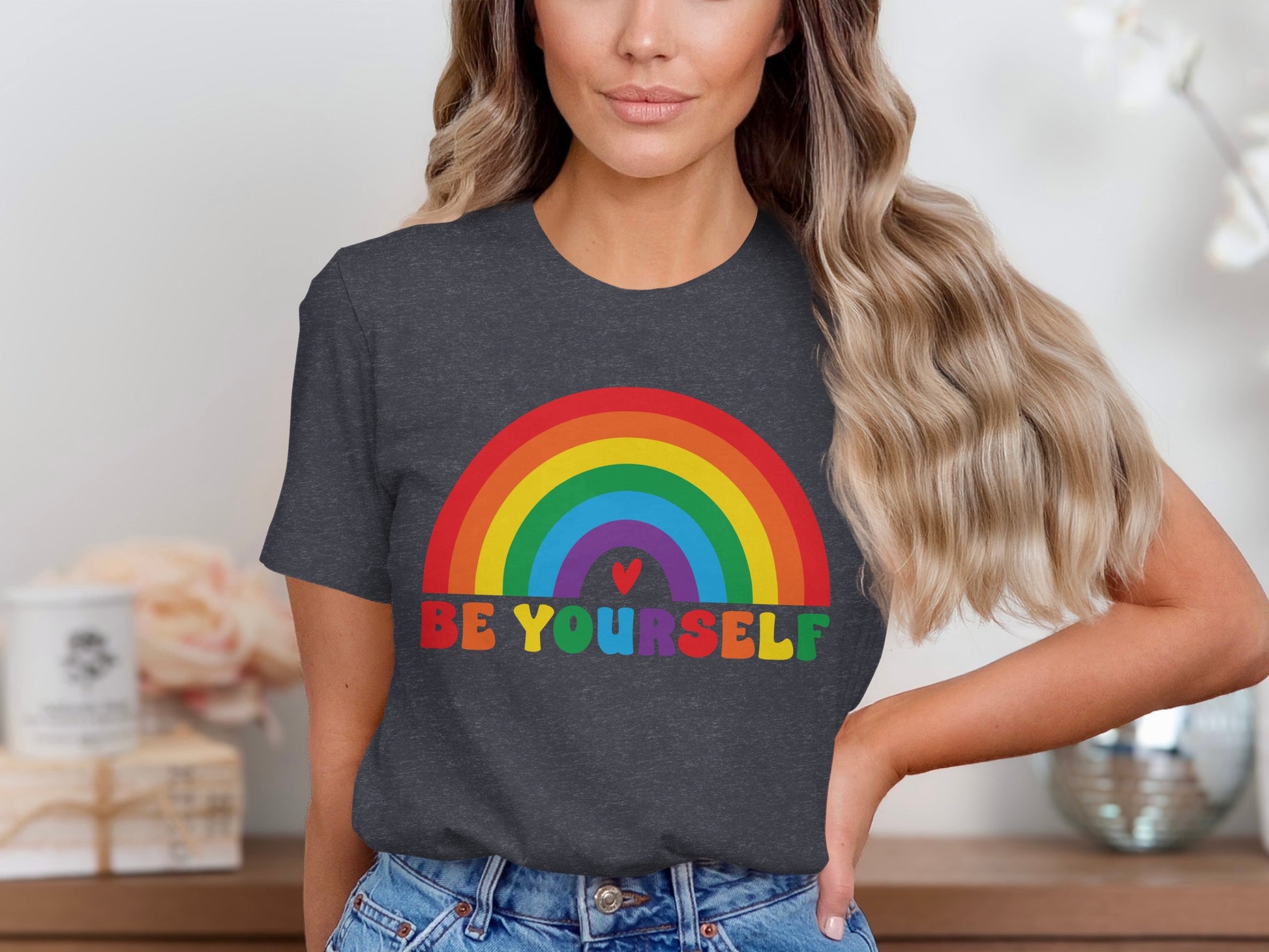 Dark t-shirt with rainbow and "BE YOURSELF" text