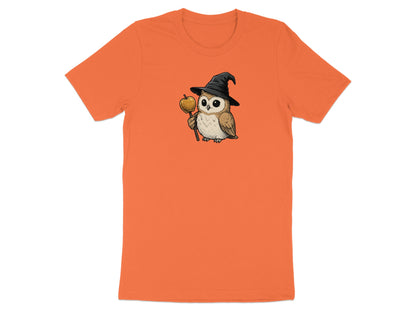 Orange t-shirt with a cartoon owl wearing a witch hat holding a caramel apple.