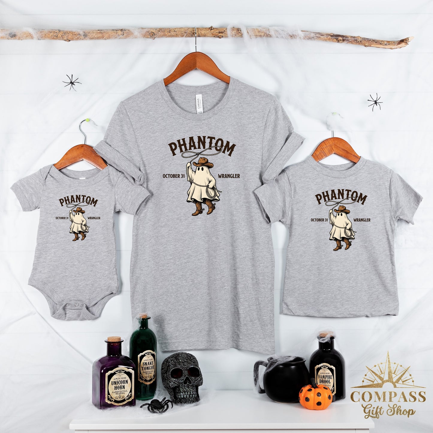 Grey toddler and adult t-shirts with ghost cowboy graphic and "Phantom Wrangler" text.