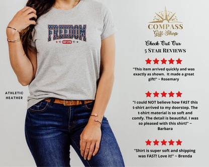 Gray t-shirt with "FREEDOM EST 1776" graphic, with customer reviews.