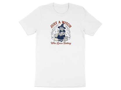 White t-shirt with a witch baking graphic and text "Just A Witch Who Loves Baking".