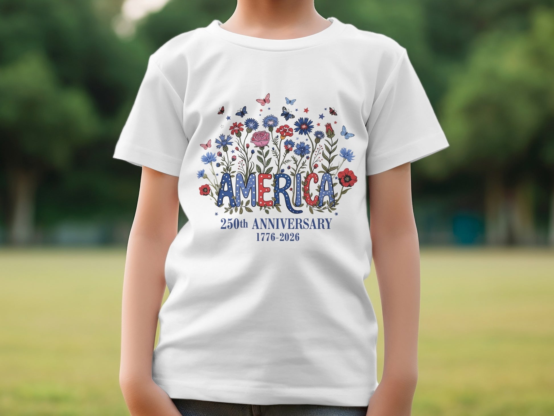 White t-shirt with "AMERICA" in floral letters and "250TH ANNIVERSARY 1776-2026".