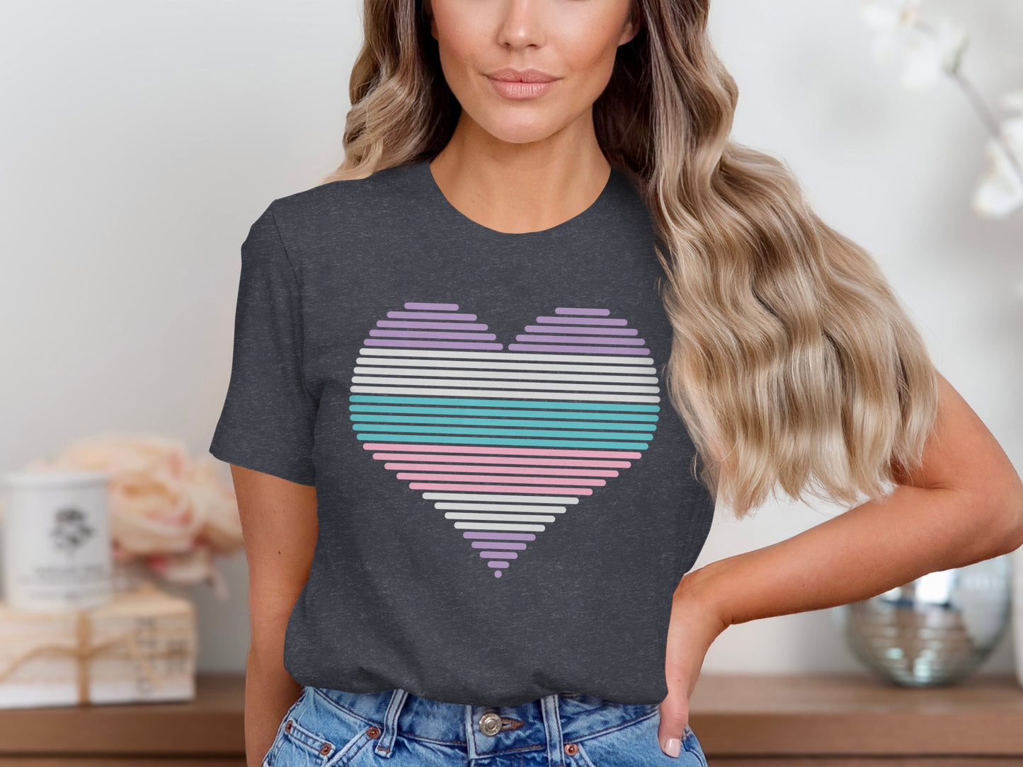 Dark grey t-shirt with a pastel striped heart design.