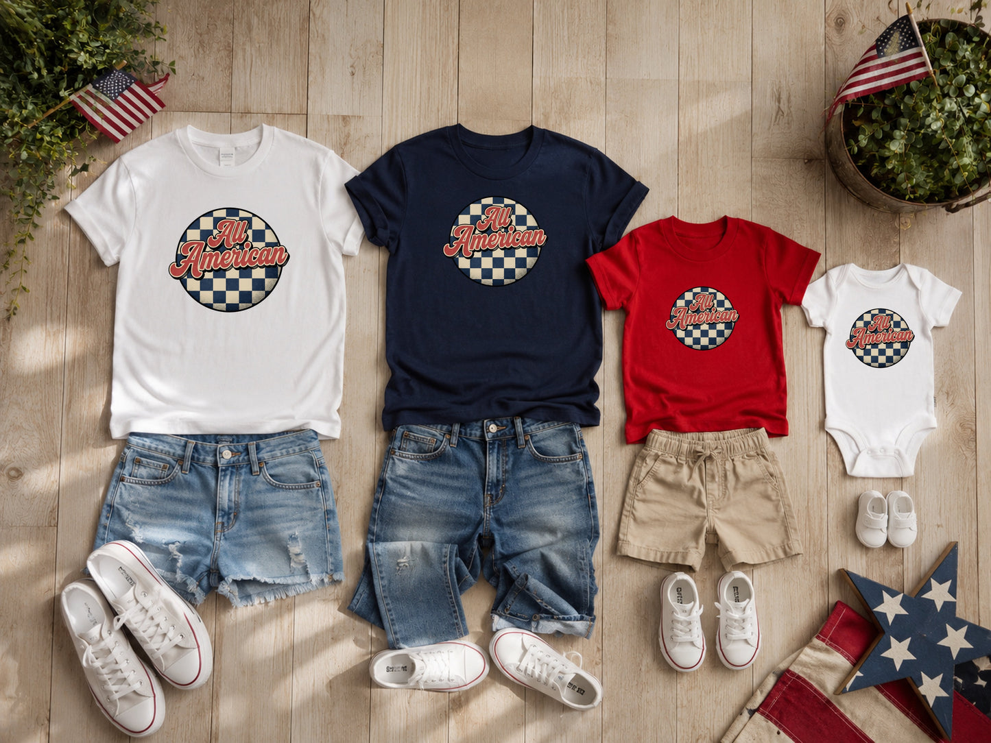Matching "All American" graphic t-shirts and onesie with denim shorts.