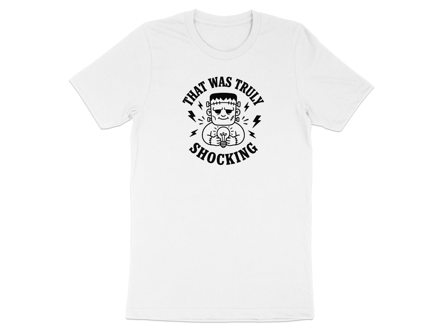 White t-shirt with Frankenstein holding a lightbulb, text "THAT WAS TRULY SHOCKING".