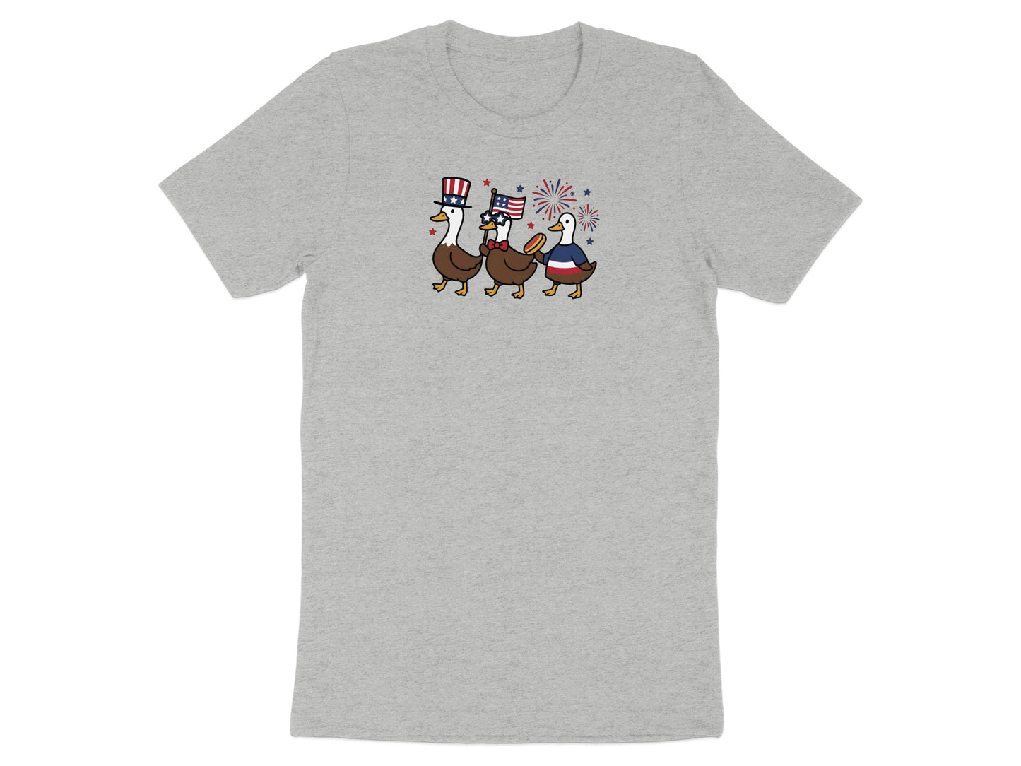 Three cartoon ducks in patriotic attire marching with a US flag.