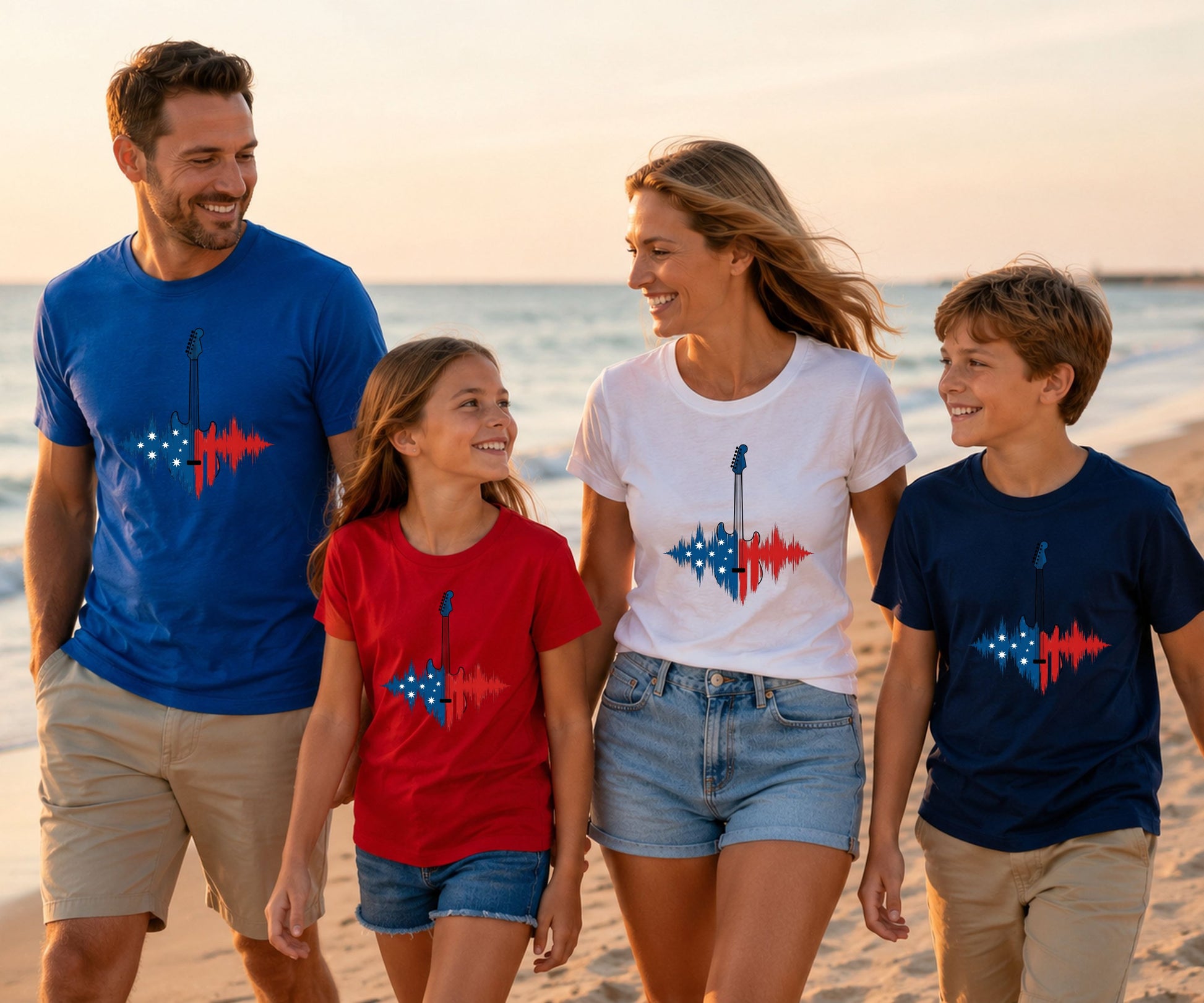 Family wearing patriotic graphic tees with American flag guitar soundwave design.