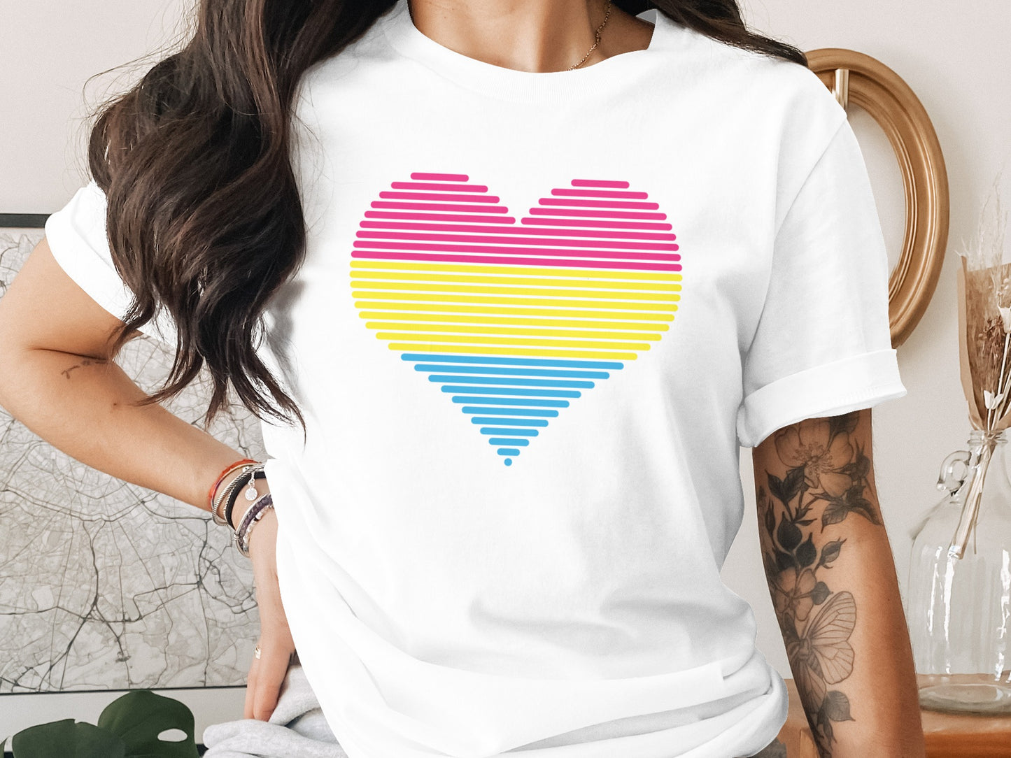 White t-shirt with a pansexual pride heart design.
