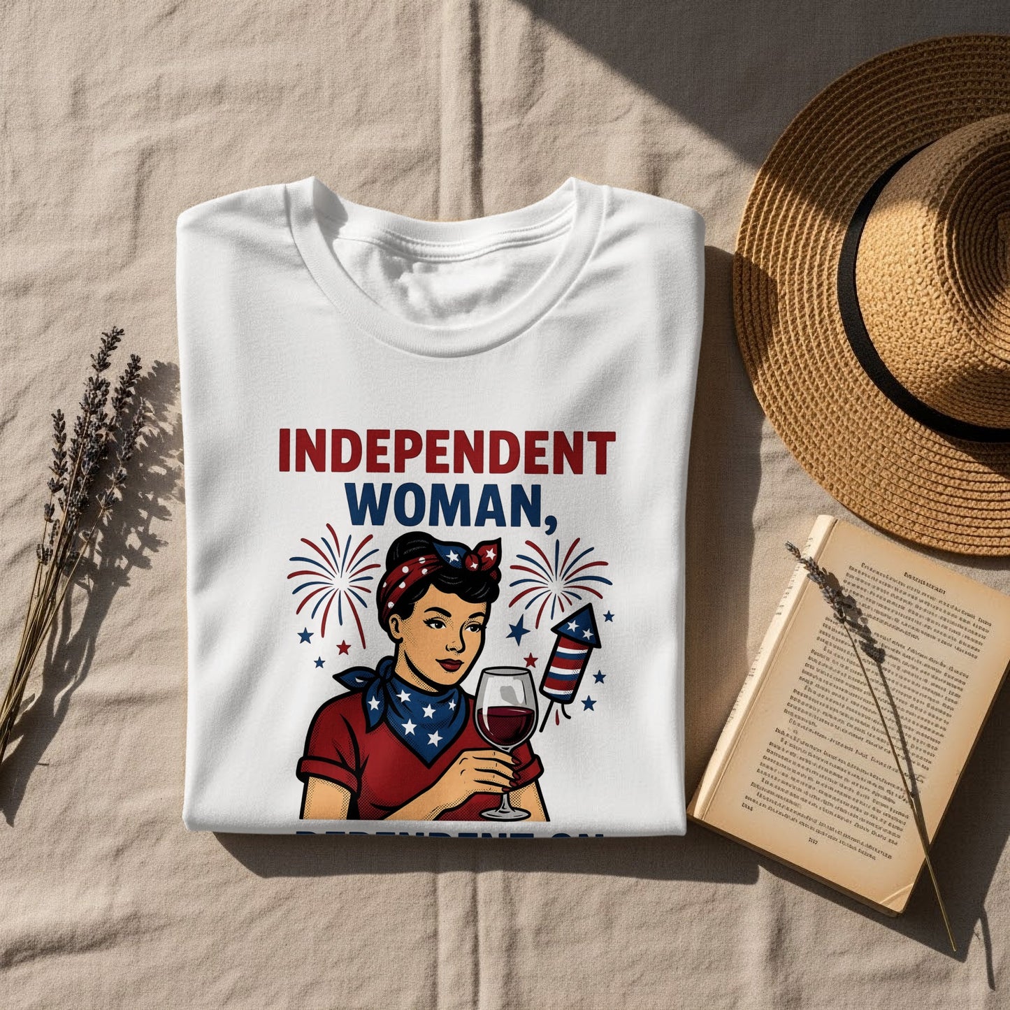 White t-shirt with "INDEPENDENT WOMAN" and fireworks graphic.