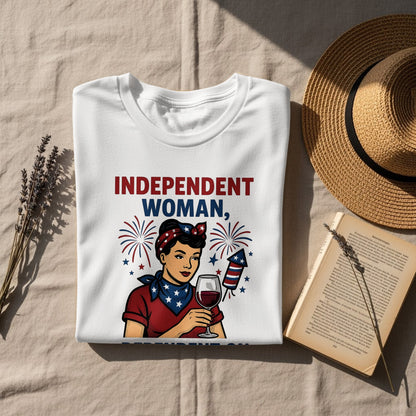 White t-shirt with "INDEPENDENT WOMAN" and fireworks graphic.
