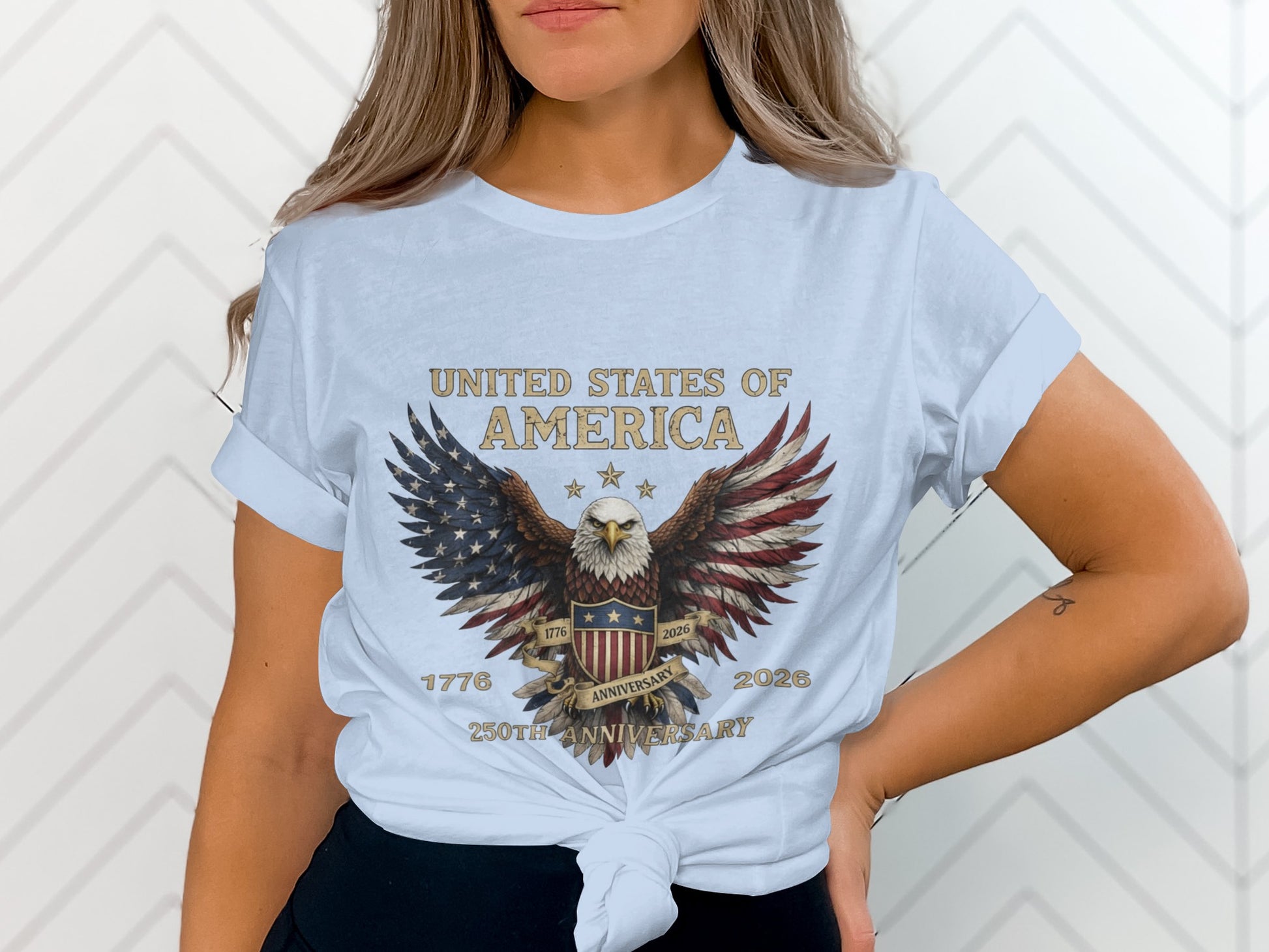 Light blue t-shirt with American flag eagle, "United States of America 1776 250th Anniversary 2026".