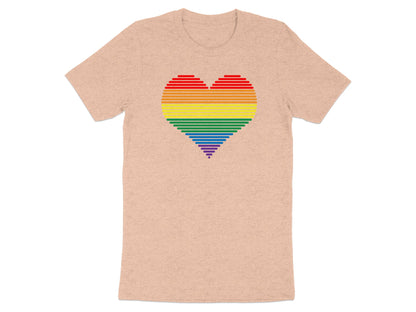 Peach t-shirt with a rainbow striped heart graphic.