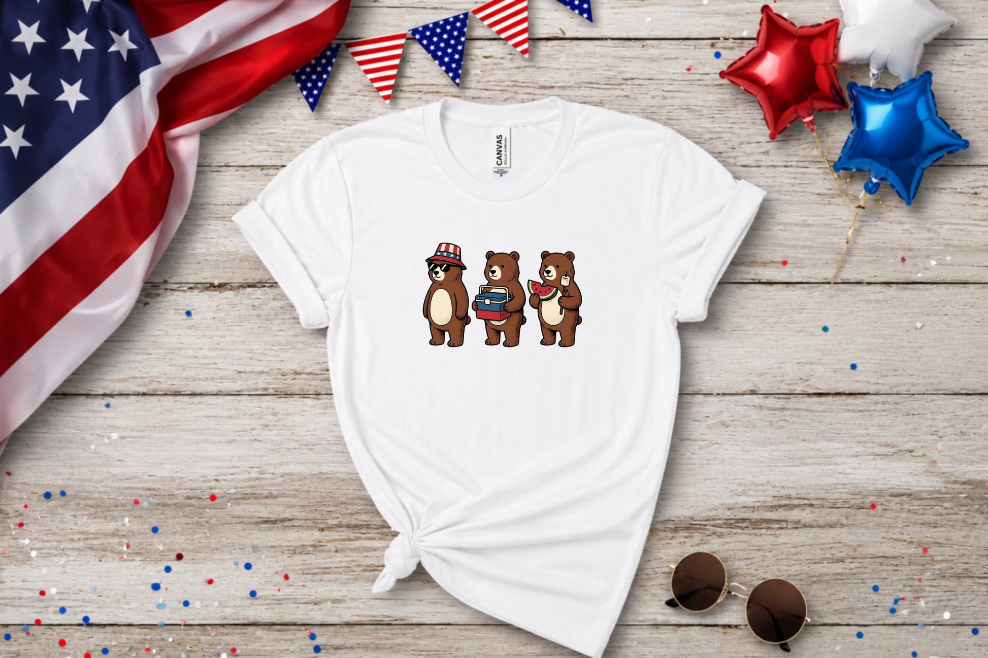 White t-shirt with cartoon bears wearing hats, holding watermelon and books, and wearing sunglasses.