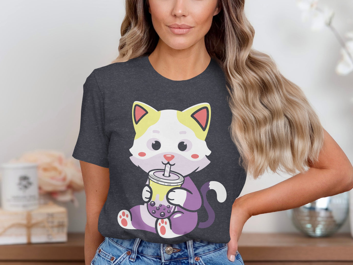 Dark gray t-shirt with cartoon cat holding a cup of bubble tea.