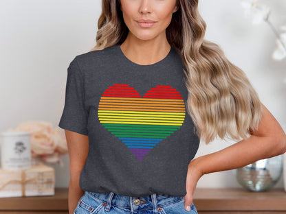 Dark grey t-shirt with rainbow heart graphic.