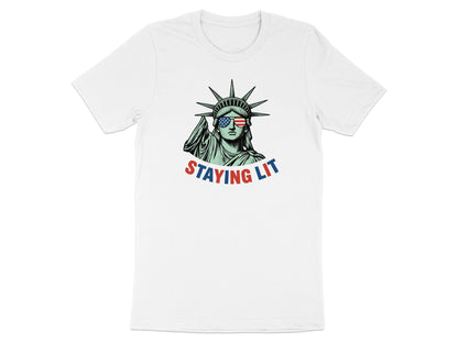 Statue of Liberty wearing American flag sunglasses, text "STAYING LIT".