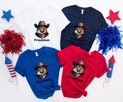 Four t-shirts with patriotic eagle graphic and "Freedom" text.