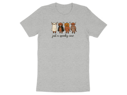 Four highland cows in Halloween costumes, including ghost, vampire, and skeleton, with text "just a spooky cow"