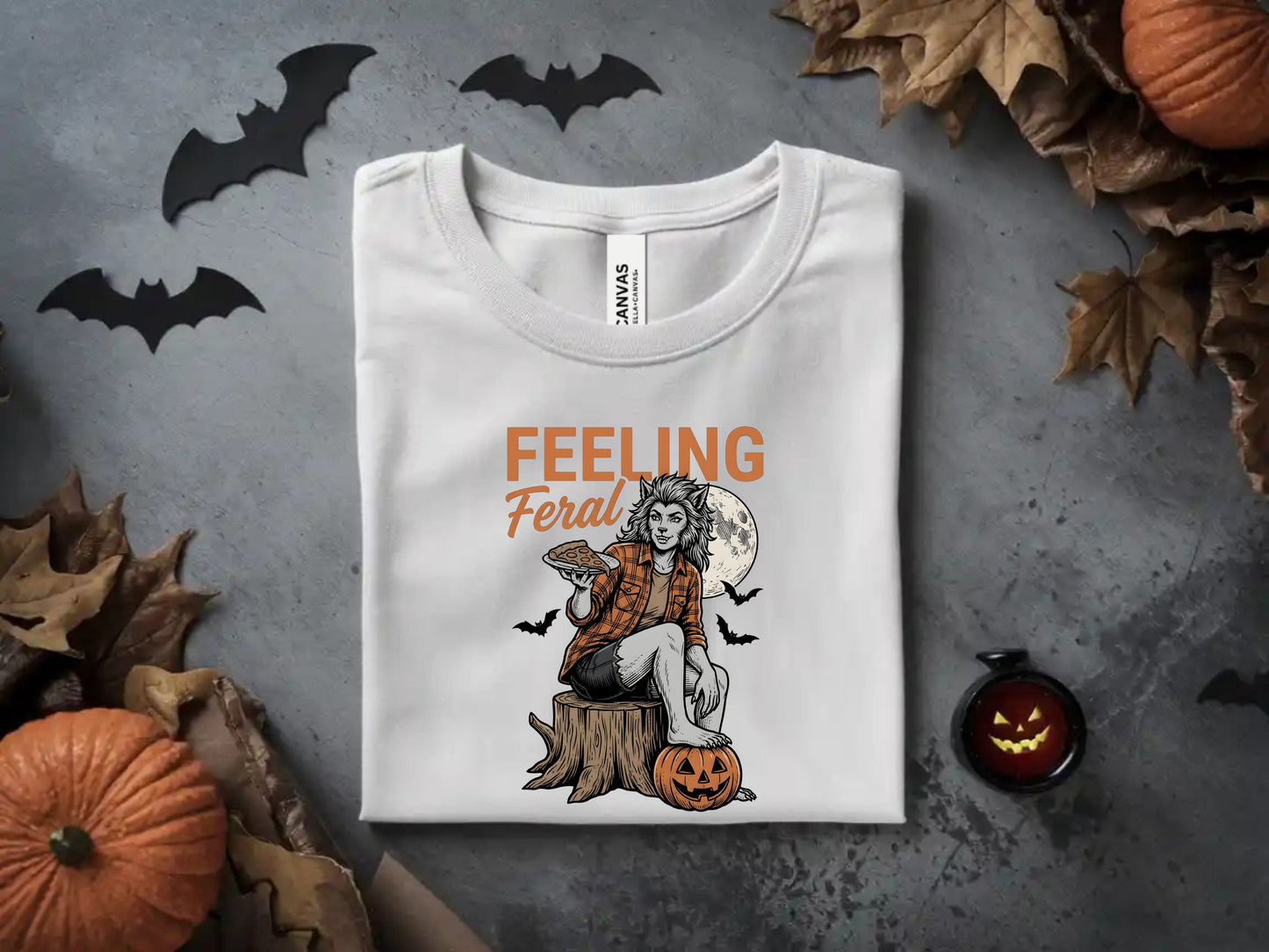 White t-shirt with "FEELING Feral" text and werewolf holding pizza.