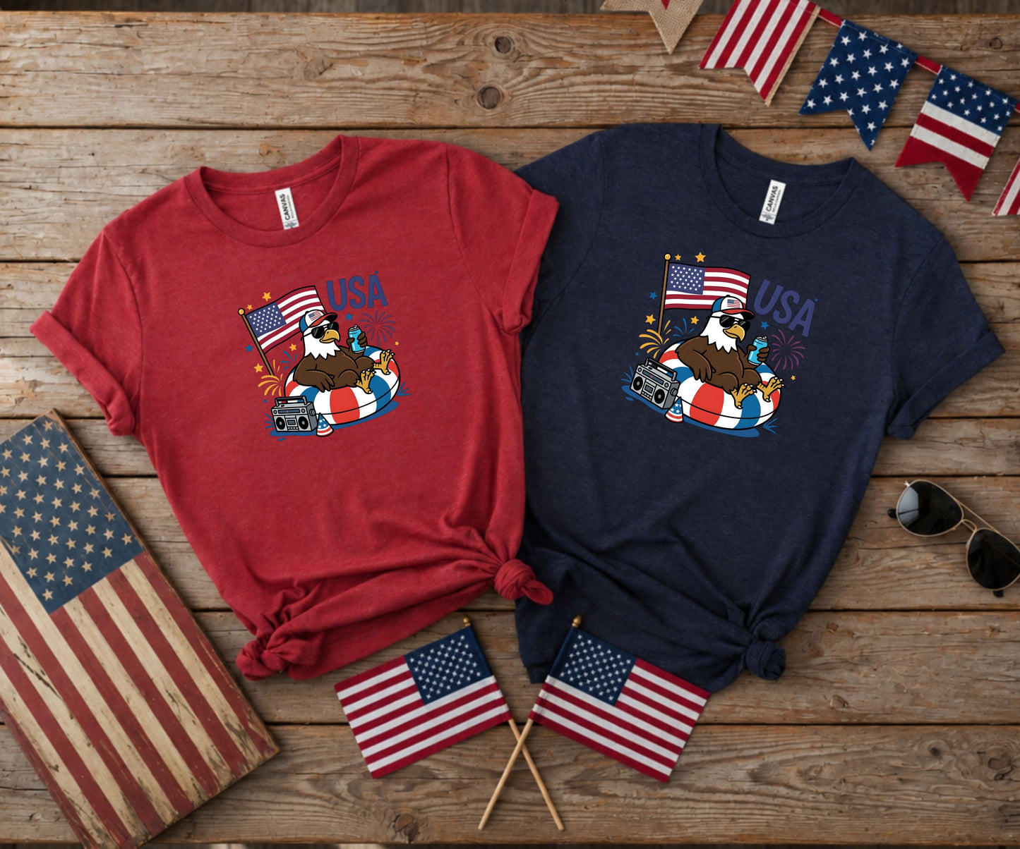 Two t-shirts with "USA" and an eagle in a float, against American flag backdrop.
