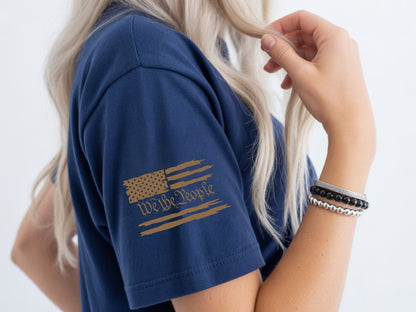 Navy t-shirt with distressed American flag and "We The People" text on sleeve.