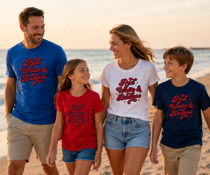 Family on beach wearing matching "Red White & Badass" t-shirts.