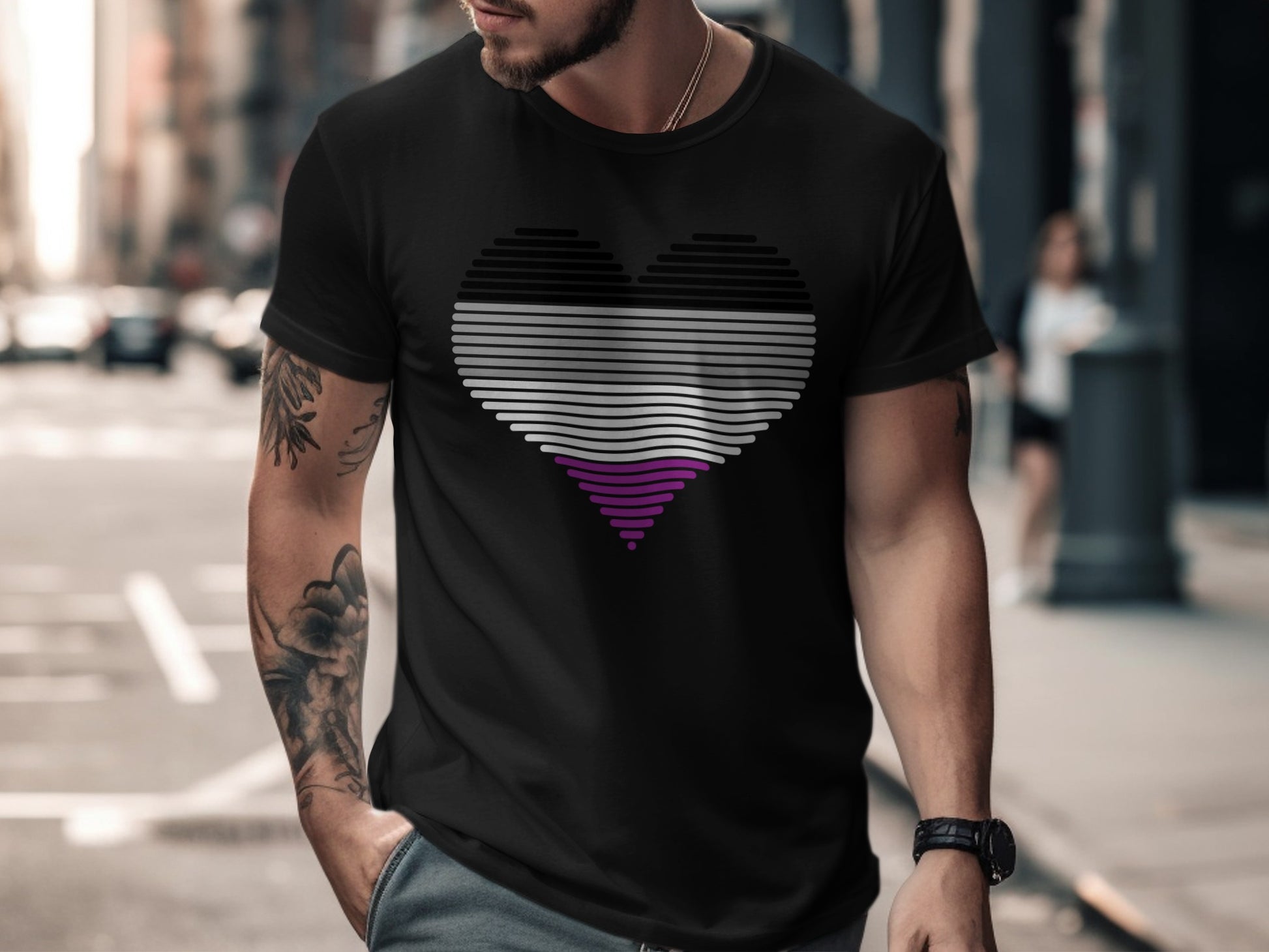 Black t-shirt with purple, white, and grey asexual pride heart design.