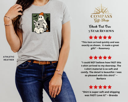 Gray t-shirt with ghost reading "The Boo" newspaper and Halloween icons.