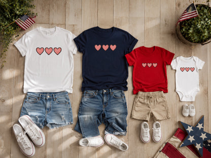Matching family outfits with red, white, and blue checkered hearts.