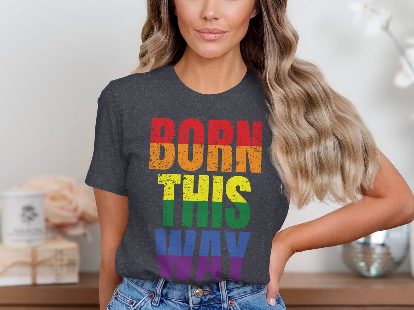 Dark t-shirt with rainbow text that reads "Born This Way".