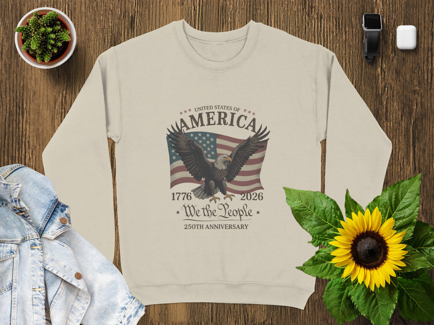 Cream sweatshirt with American flag and "250th Anniversary" text.