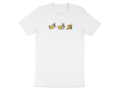 White t-shirt with cartoon skeletons and dogs playing and sitting.